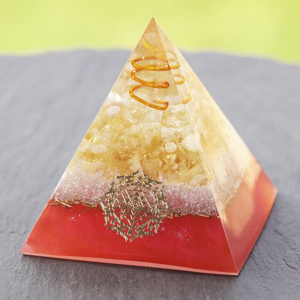 Healing Crystal Orgone Pyramid featuring copper wire, made from natural citrine and resin, designed for EMF protection and meditation.