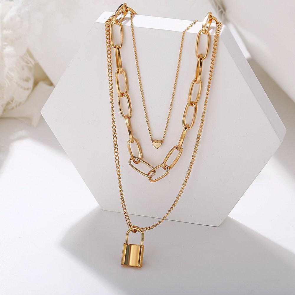 Elegant Heart Chain Lock Necklace in 18K gold plating, featuring a link chain design and lobster clasp closure.