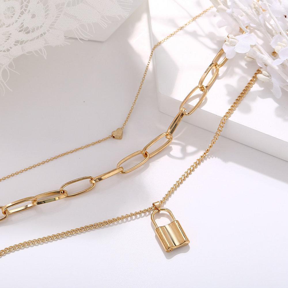 Elegant Heart Chain Lock Necklace in 18K gold plating, featuring a link chain design and lobster clasp closure.