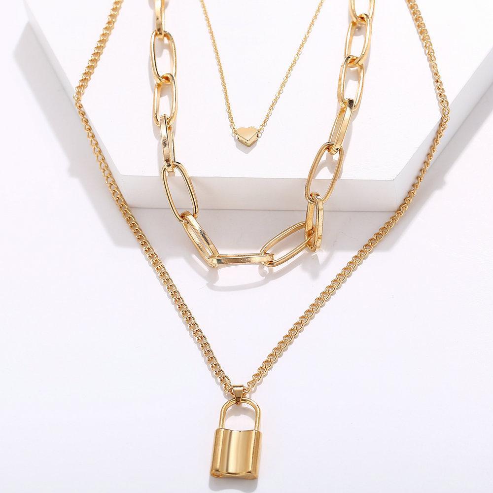 Elegant Heart Chain Lock Necklace in 18K gold plating, featuring a link chain design and lobster clasp closure.