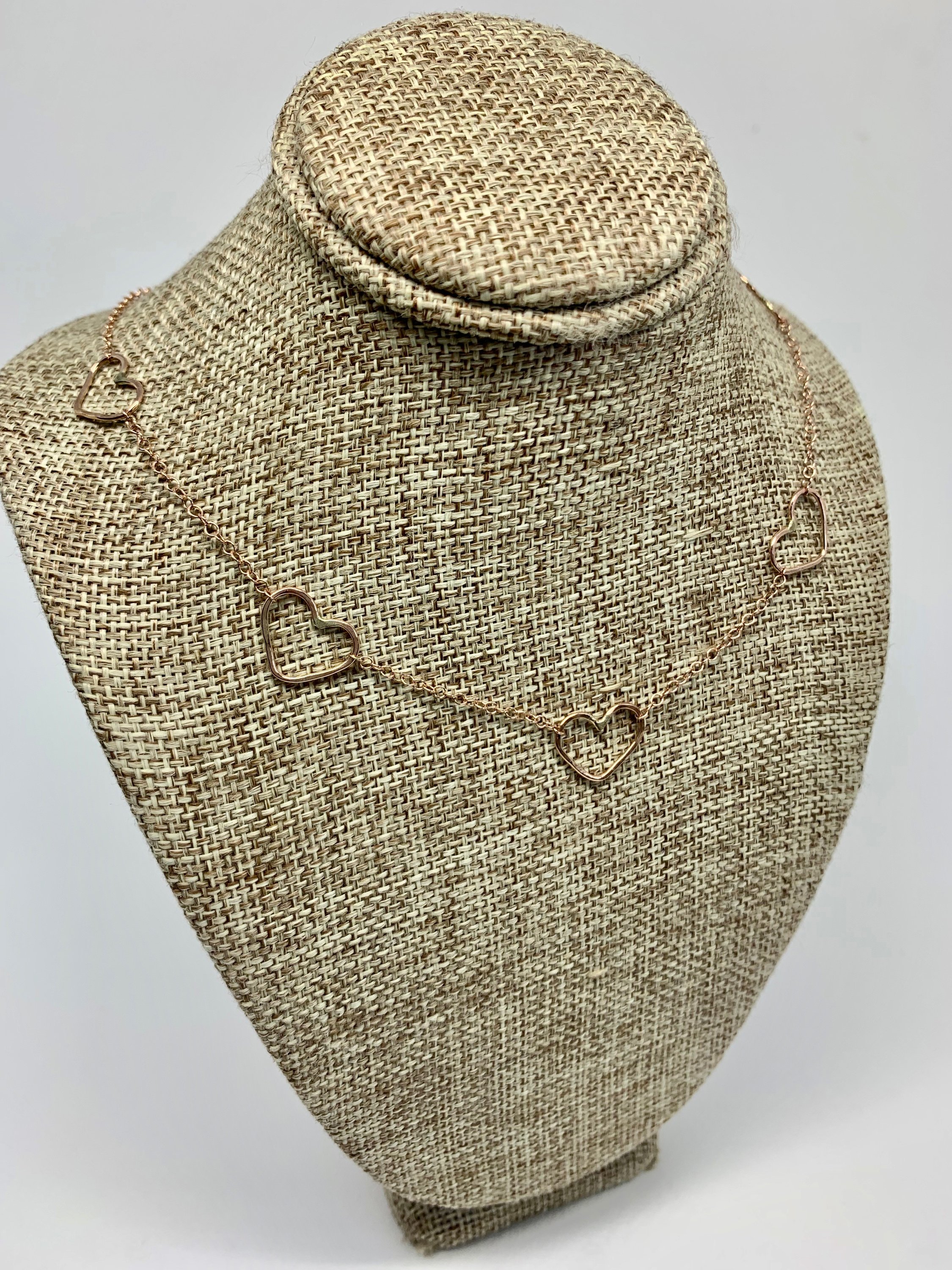 Handmade Heart Choker Necklace in sterling silver, rose gold fill, and yellow gold fill with textured hammered hearts.