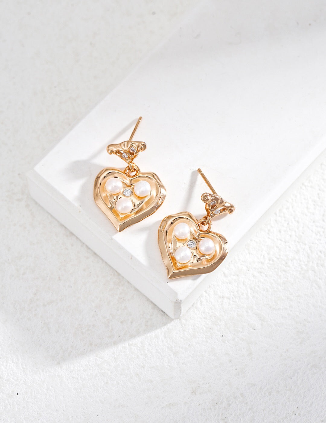 Heart Freshwater Pearl Dangle Earrings featuring gold vermeil and natural pearls, elegantly handcrafted for a luxurious look.