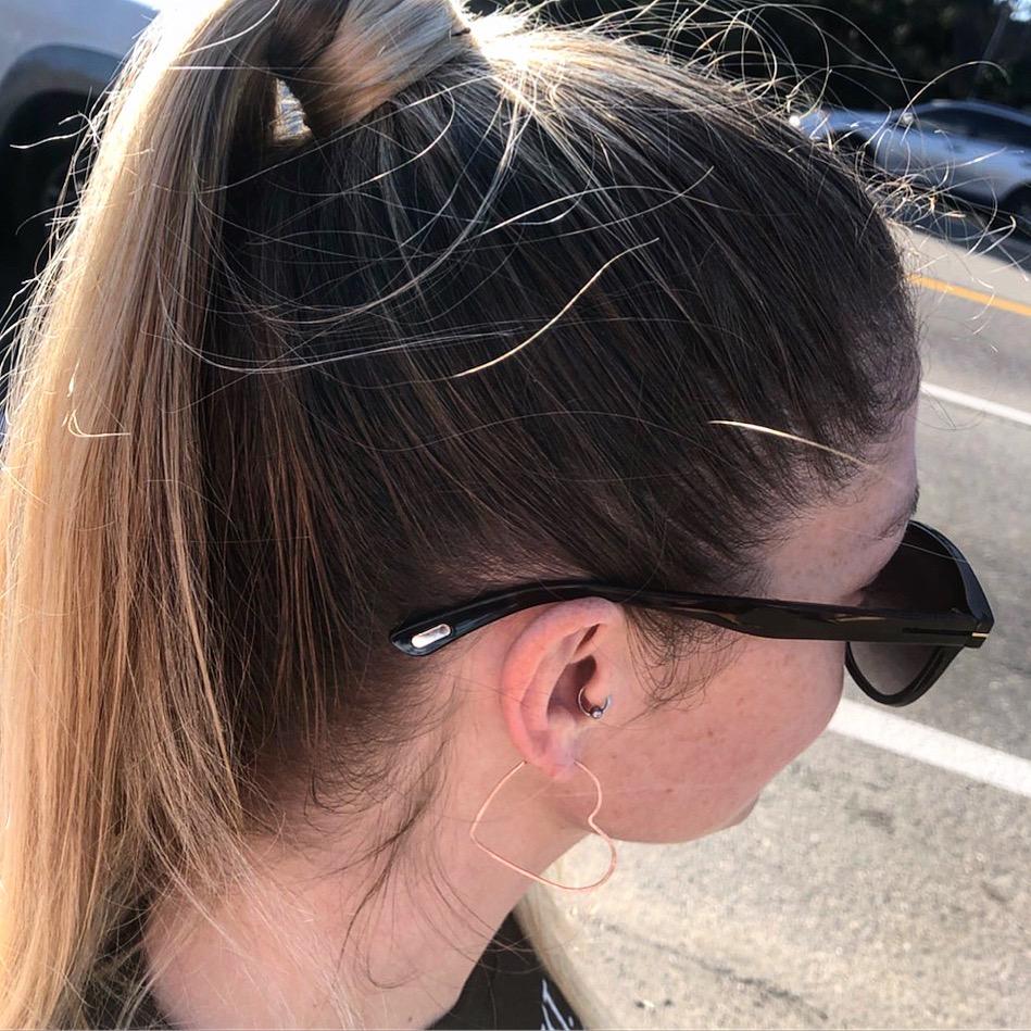 Large heart-shaped hoops made from 20 gauge wire, featuring a hammered texture for shine, available in silver, yellow gold fill, and rose gold fill.