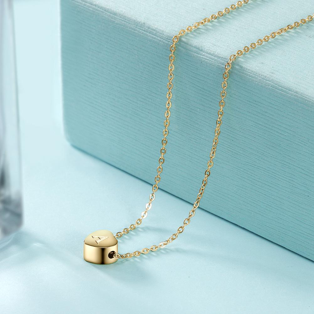 A beautiful Heart Initial Necklace made of 316L surgical stainless steel with 14K gold plating, featuring a customizable initial pendant.