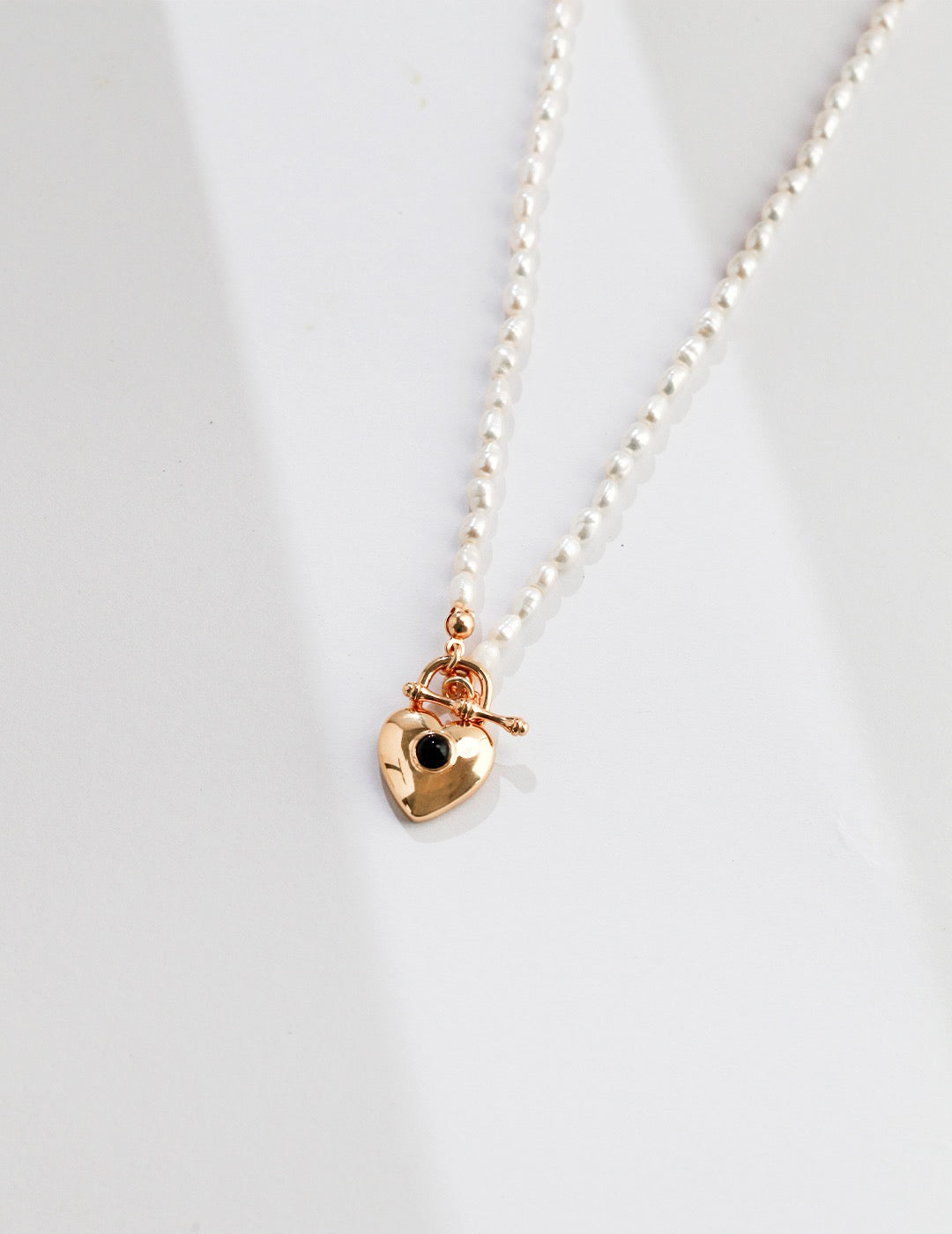 Heart Padlock Pendant Pearl Necklace featuring natural pearls and gold vermeil, elegantly designed for a sophisticated look.