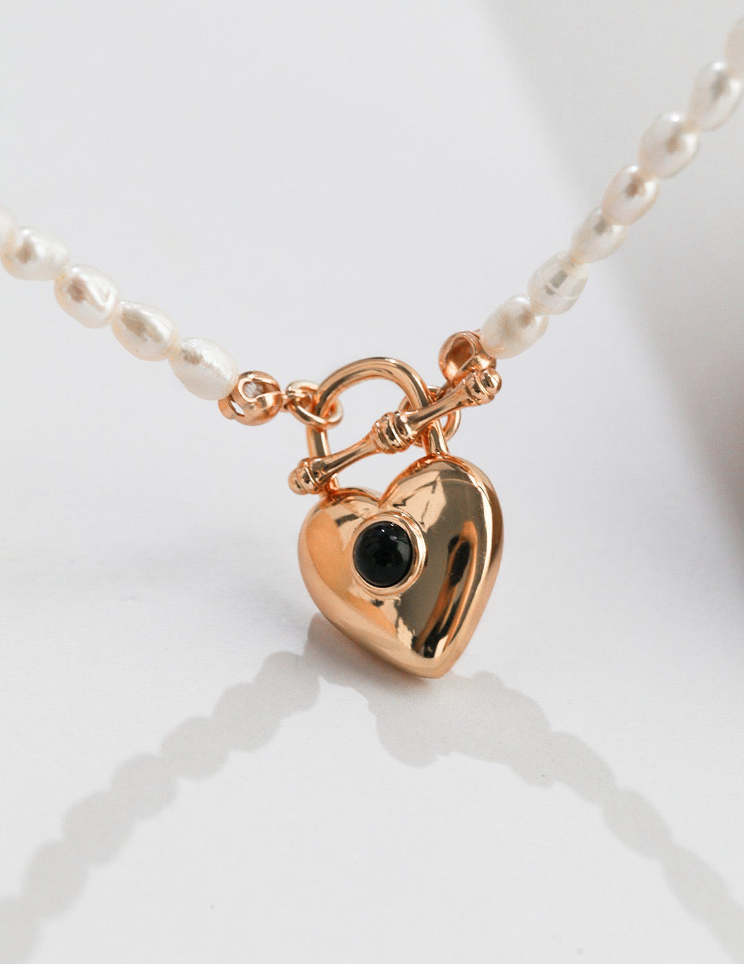 Heart Padlock Pendant Pearl Necklace featuring natural pearls and gold vermeil, elegantly designed for a sophisticated look.