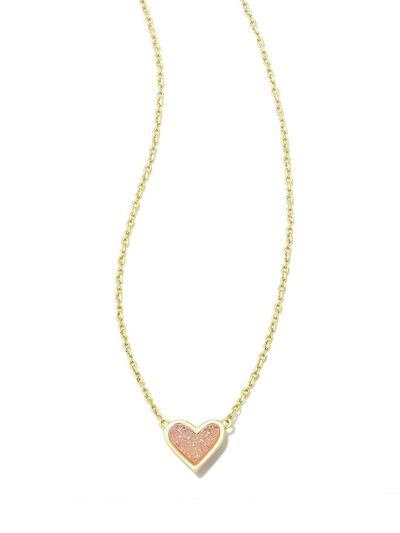 A beautiful heart pendant necklace made of copper and 14K gold-plated, showcasing its elegant design and craftsmanship.