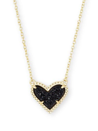 A beautiful heart pendant necklace made of copper and 14K gold-plated, showcasing its elegant design and craftsmanship.