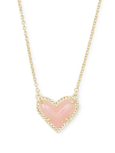 A beautiful heart pendant necklace made of copper and 14K gold-plated, showcasing its elegant design and craftsmanship.