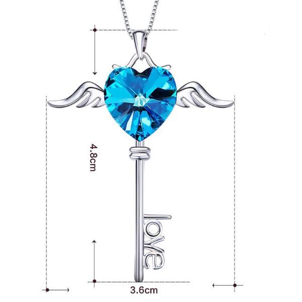 Heart shaped blue elements dangling key necklace in 14K white gold, featuring a beautiful blue pendant and a link chain.