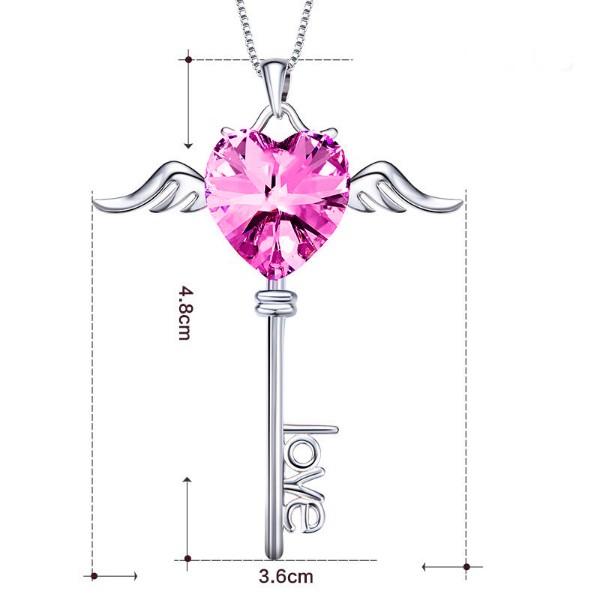 Heart shaped pink elements dangling key necklace in 14K white gold, featuring a delicate link chain and lobster clasp.