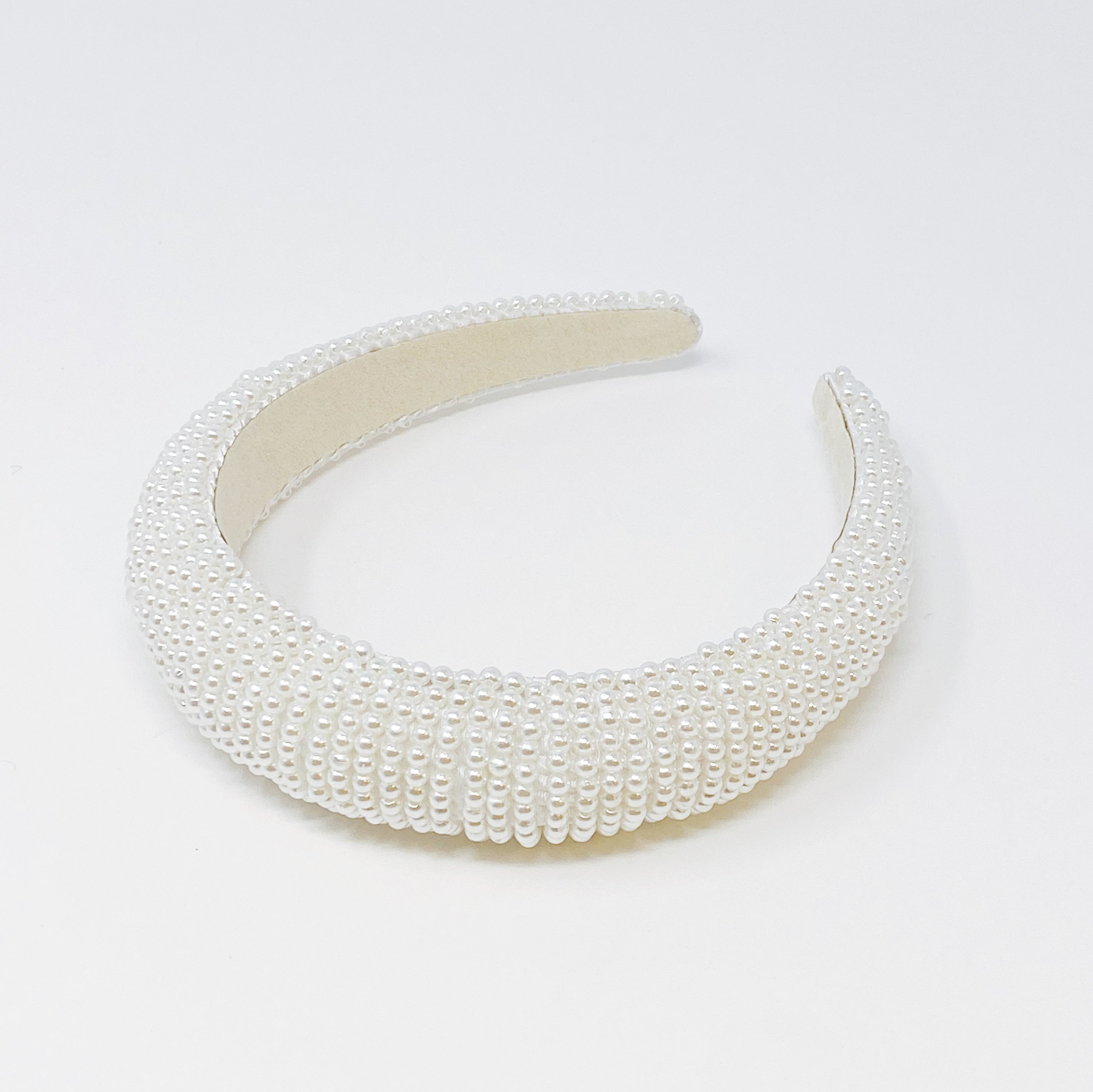 Heaven Of Pearls Headband featuring small pearl beads, elegantly designed for special occasions and everyday wear.