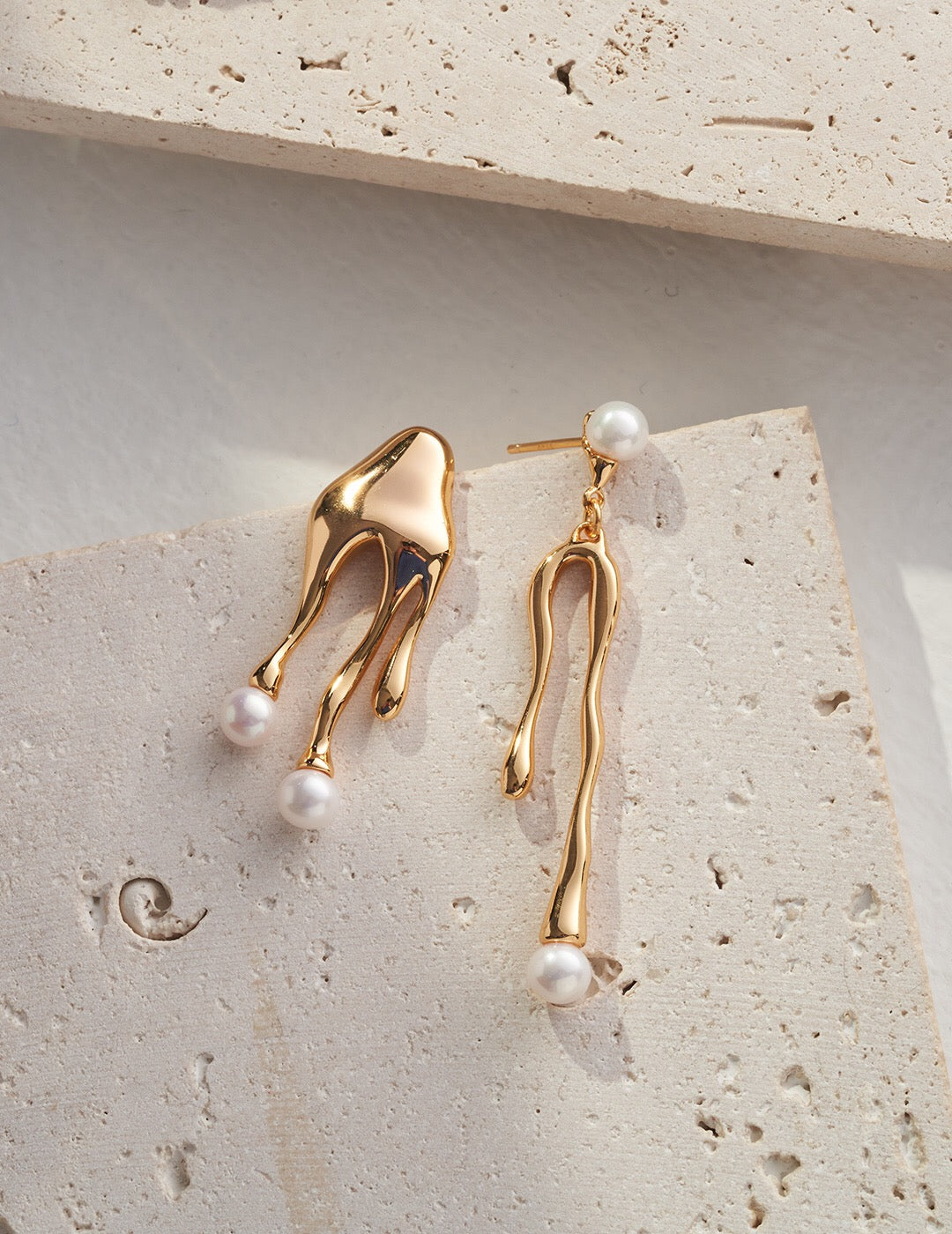 Helene Ocean Asymmetrical Earrings featuring natural pearls and sterling silver, showcasing a unique design with one earring larger than the other.