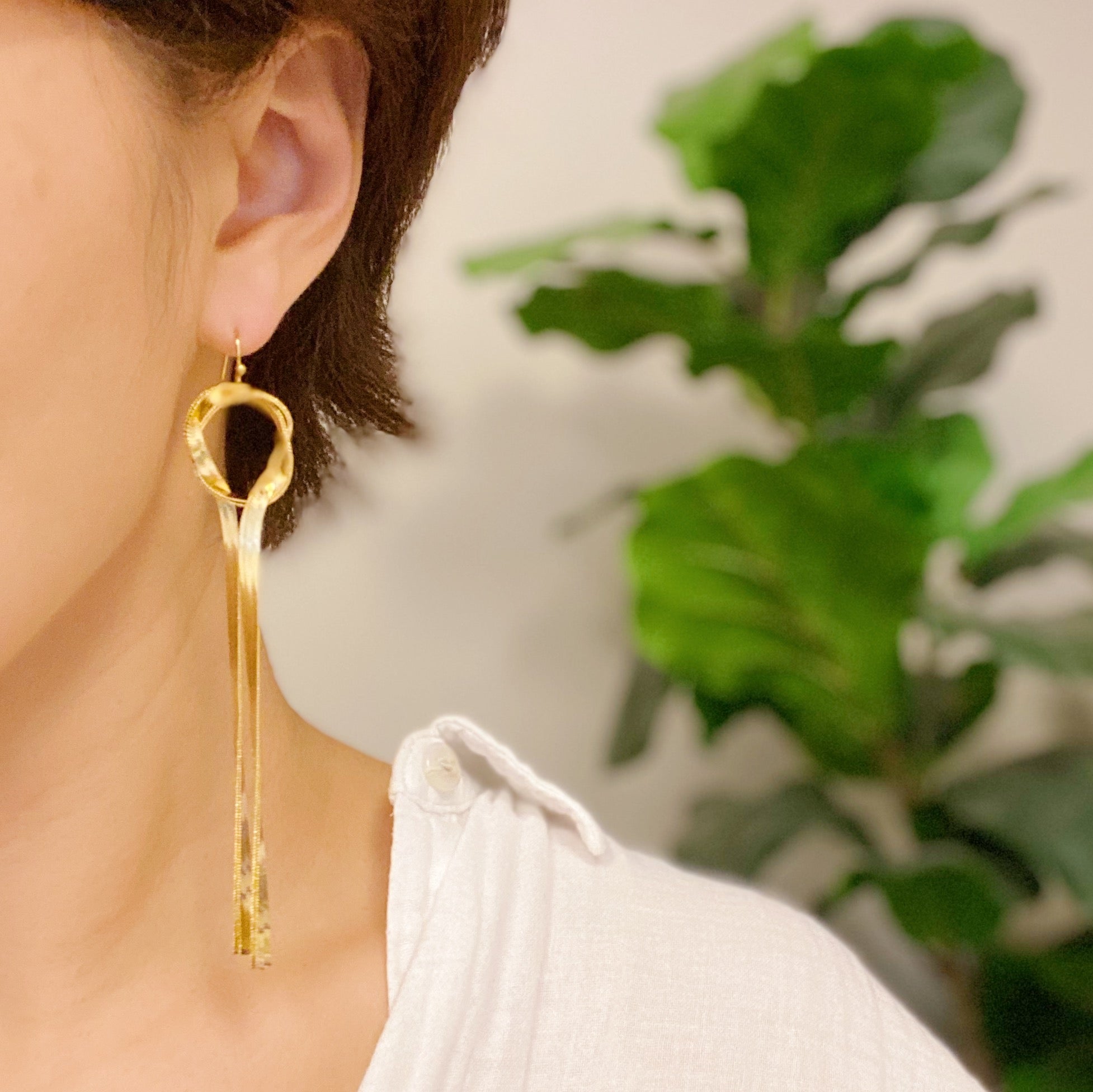 Elegant Herringbone Chain Drop Earrings in 18K gold plating, showcasing a sophisticated design with a unique herringbone pattern.