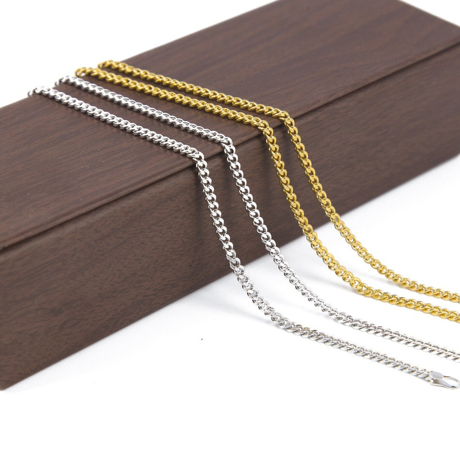 A stylish Hiphop Cuban Link Chain made of stainless steel, featuring interlocking links for a bold and fashionable look.