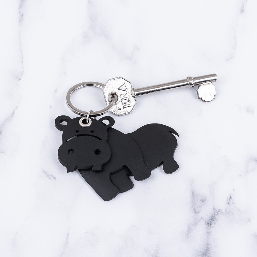 A colorful 3D hippo keyring made from recycled rubber, showcasing its unique design and eco-friendly craftsmanship.