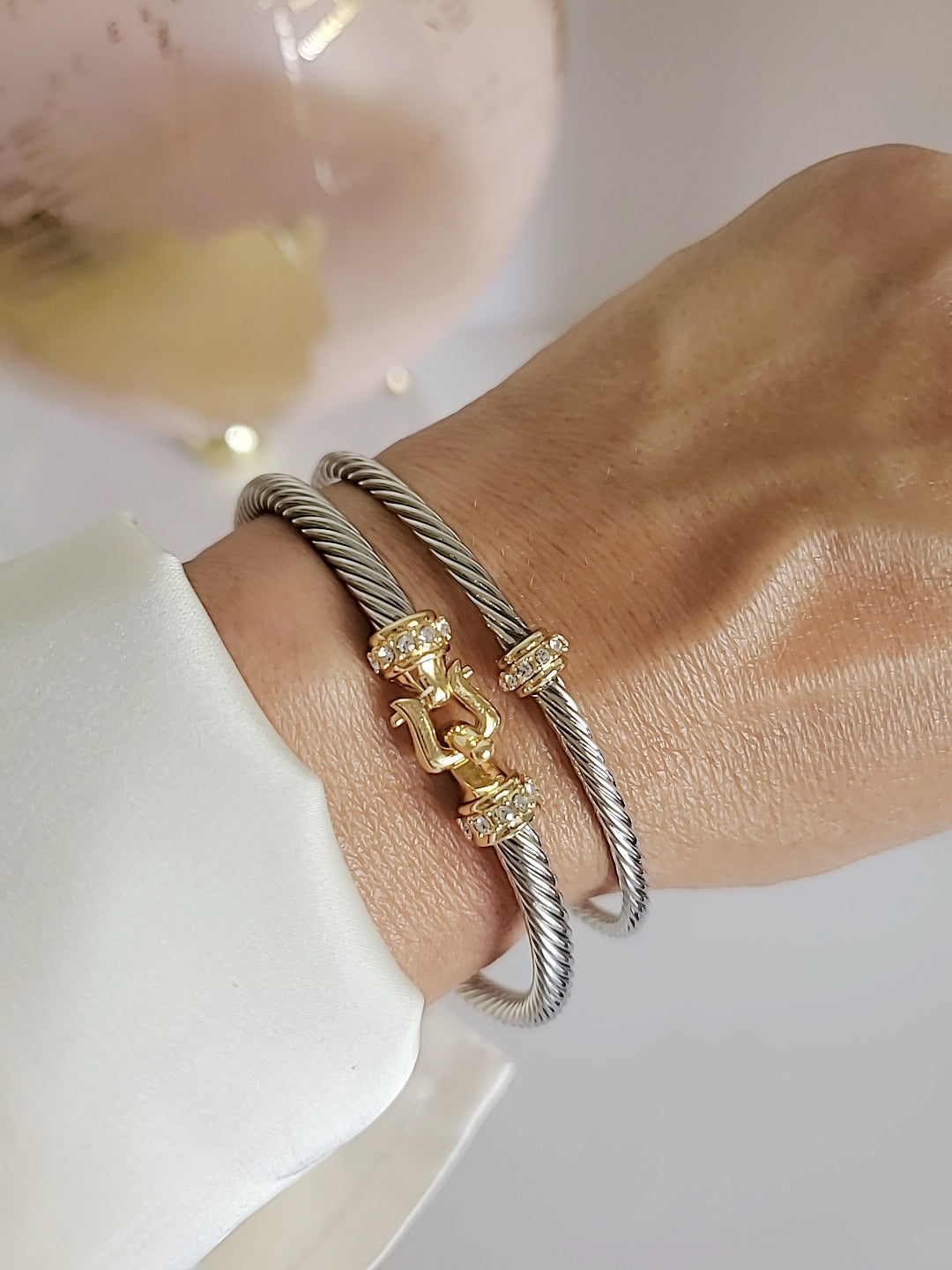 A stunning Hook Bangle Bracelet featuring an 18K Gold Filled design with a unique hook closure, made from durable stainless steel.