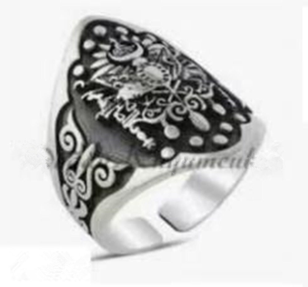 A beautifully crafted Holy Flower Ring made of alloy, featuring an intricate floral design, available in multiple sizes.