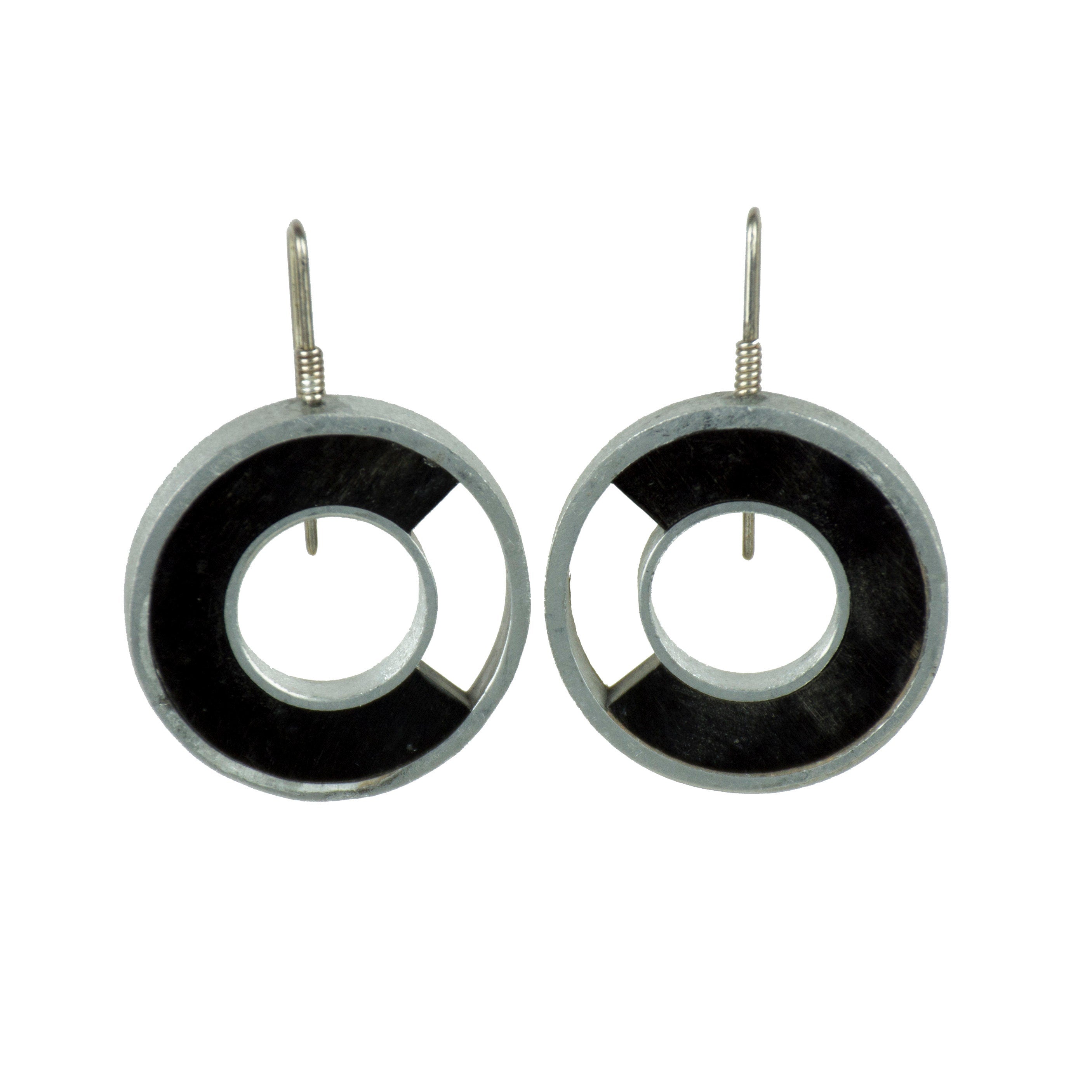 Elegant black horn hoop earrings for women with aluminum edging and silver clasp, showcasing a luxurious design.