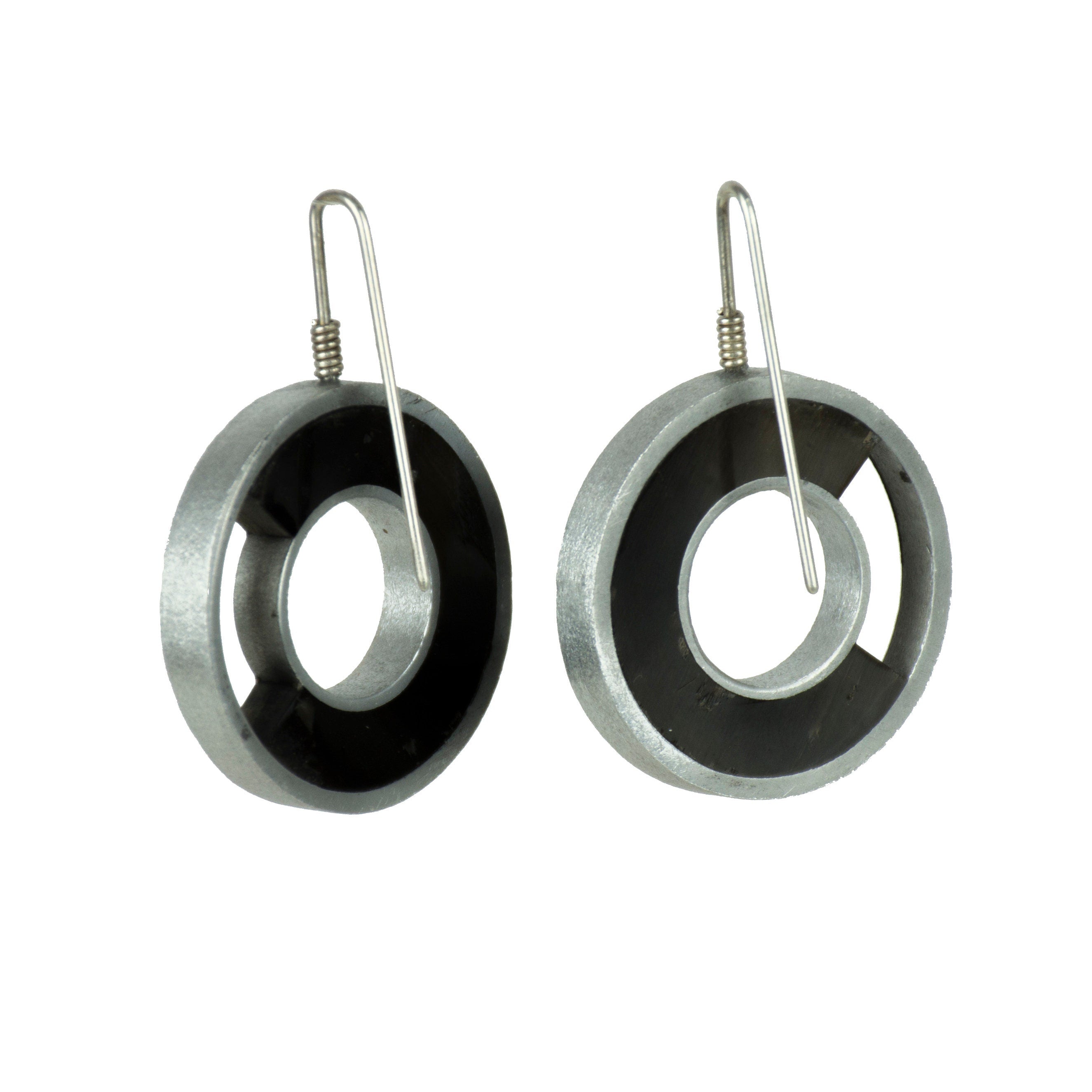 Elegant black horn hoop earrings for women with aluminum edging and silver clasp, showcasing a luxurious design.