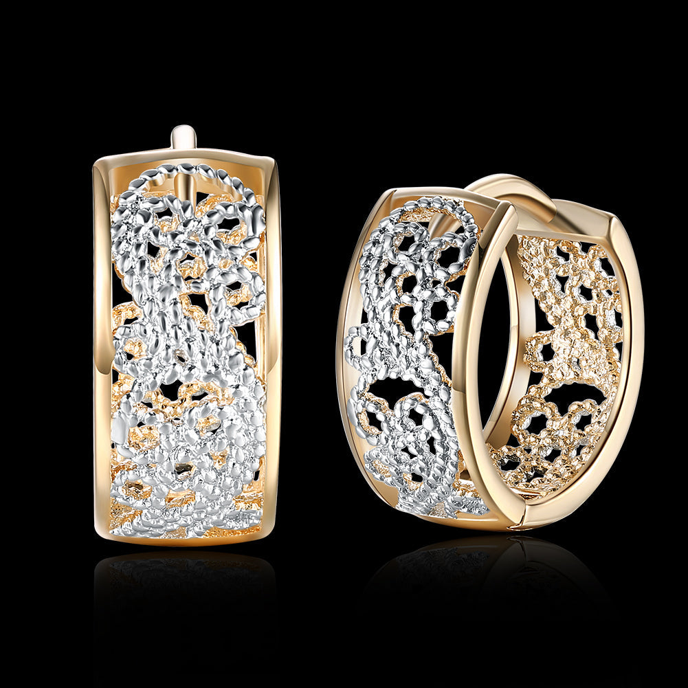 Elegant Huggie Earring in 18K gold plating, showcasing a sleek design perfect for everyday wear.