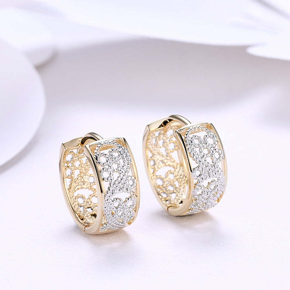 Elegant Huggie Earring in 18K gold plating, showcasing a sleek design perfect for everyday wear.