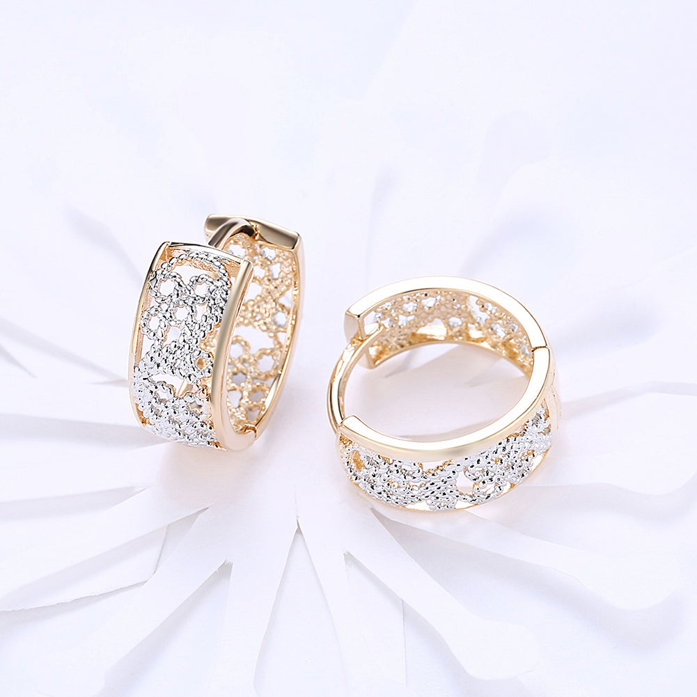 Elegant Huggie Earring in 18K gold plating, showcasing a sleek design perfect for everyday wear.