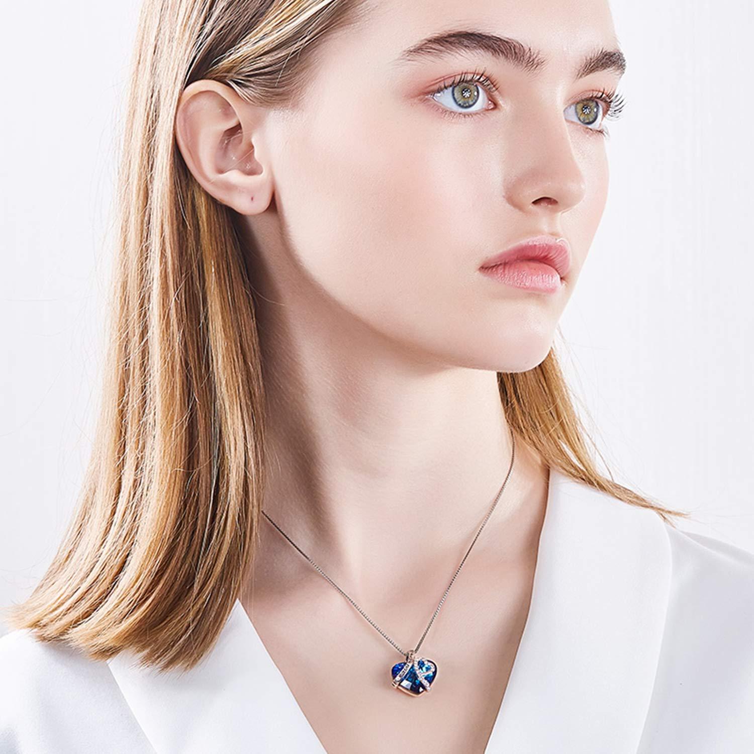 I LOVE YOU FOREVER Blue Crystal Heart Necklace in 18K White Gold, featuring a heart-shaped Bermuda Blue crystal and elegant gift box.