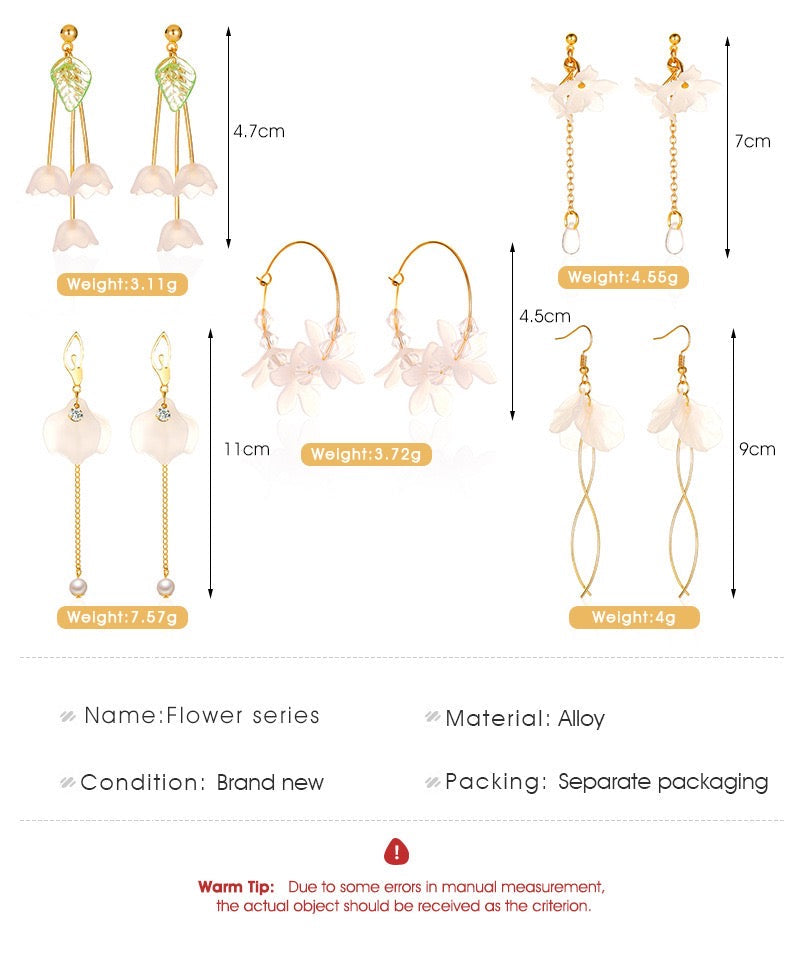 A pair of elegant Ice Flower Pedals Earrings featuring a unique curly string design, crafted from alloy and plastic, showcasing delicate floral details.