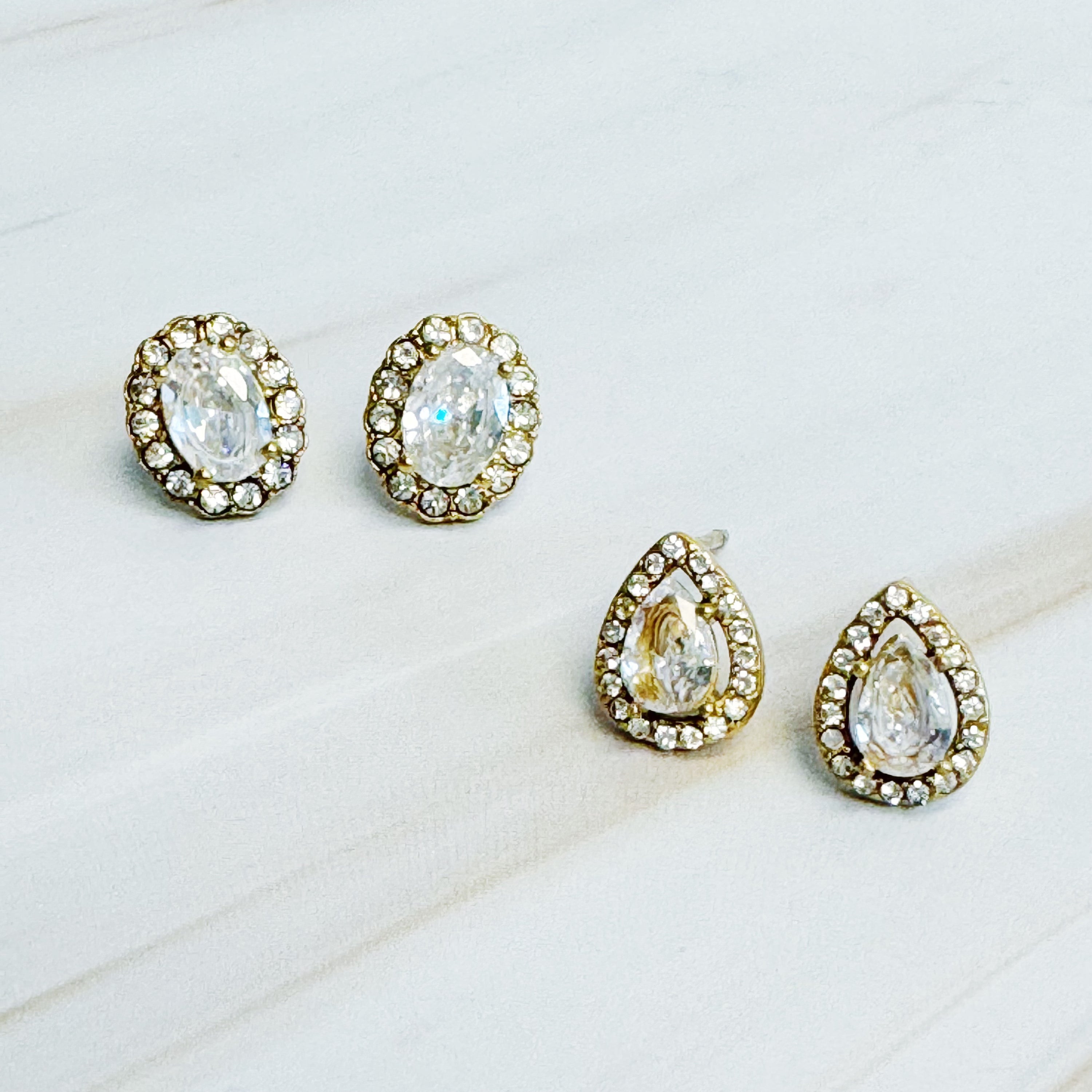 Elegant Ideal Cut Crusted Stud Earrings in 18k gold plated stainless steel, showcasing a unique cut crusted design.