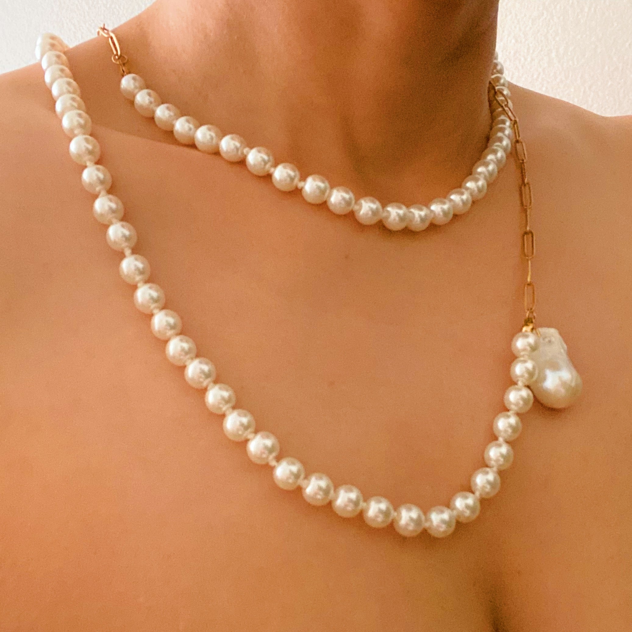 In Your Way Pearl And Chain Long Necklace featuring a baroque pearl pendant and gold plated chain, elegantly displayed.