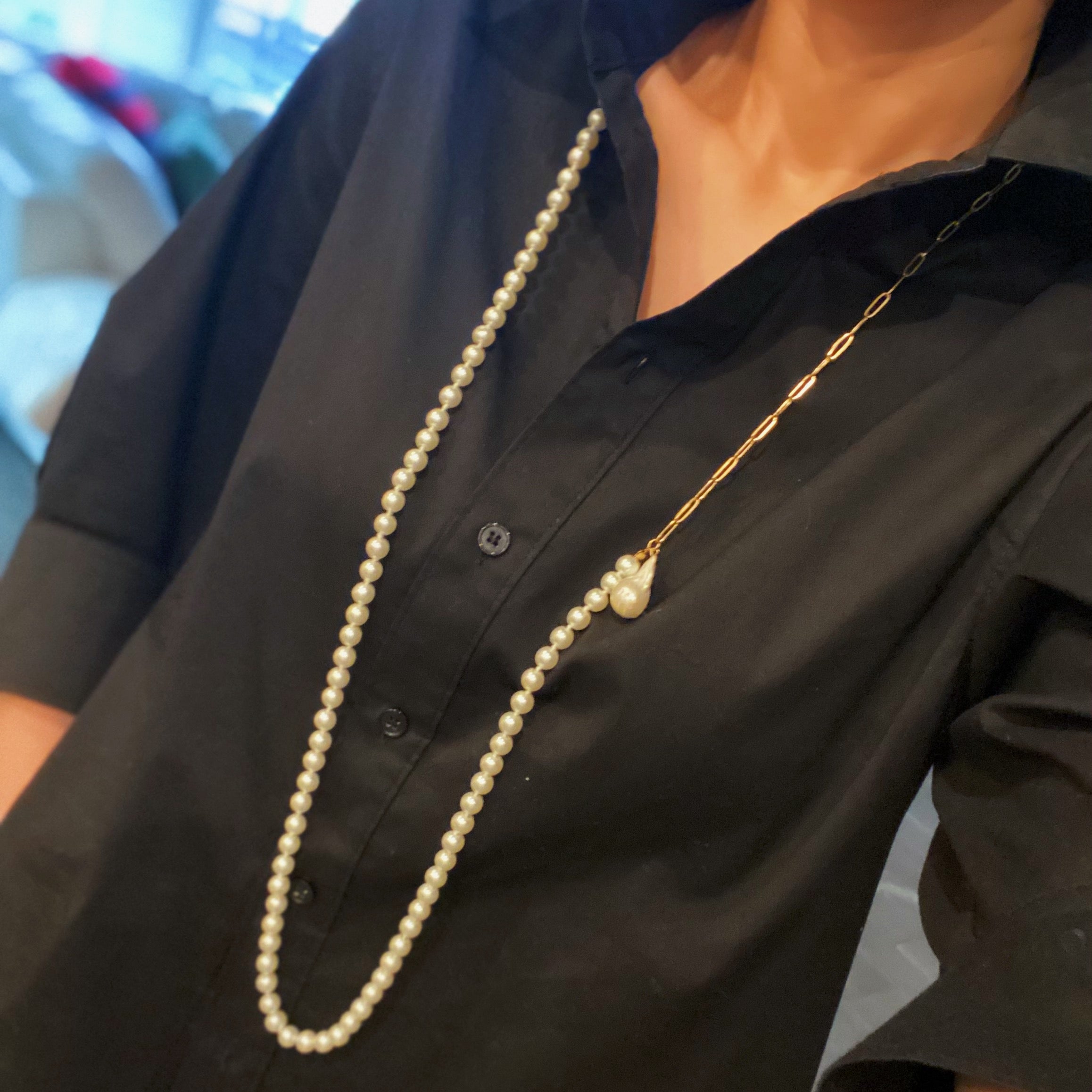 In Your Way Pearl And Chain Long Necklace featuring a baroque pearl pendant and gold plated chain, elegantly displayed.