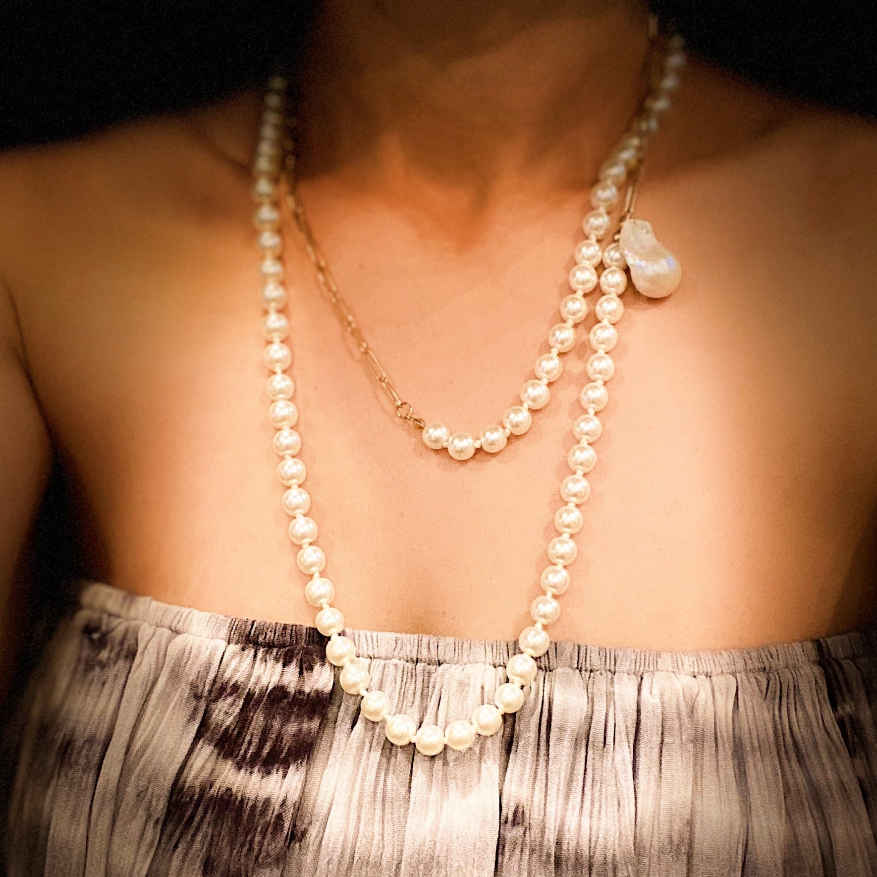 In Your Way Pearl And Chain Long Necklace featuring a baroque pearl pendant and gold plated chain, elegantly displayed.