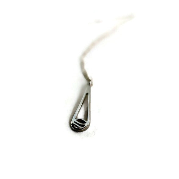 Indra Rain Drop Necklace featuring a minimalist rain drop pendant in 925 sterling silver on a delicate cable chain.