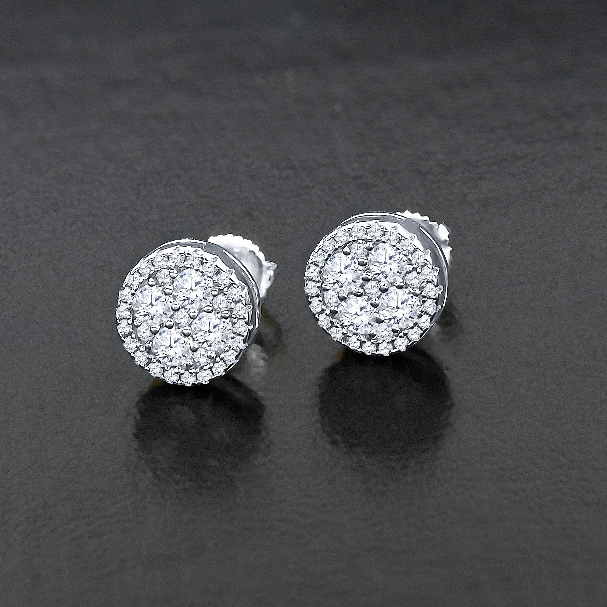 INEFFABLE Screw Back Earrings featuring cubic zirconia stones set in 925 sterling silver, elegantly designed for a floating effect.