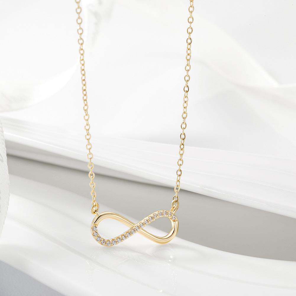 Elegant Infinity CZ Necklace made of surgical stainless steel with 14K gold plating, featuring sparkling cubic zirconia stones.