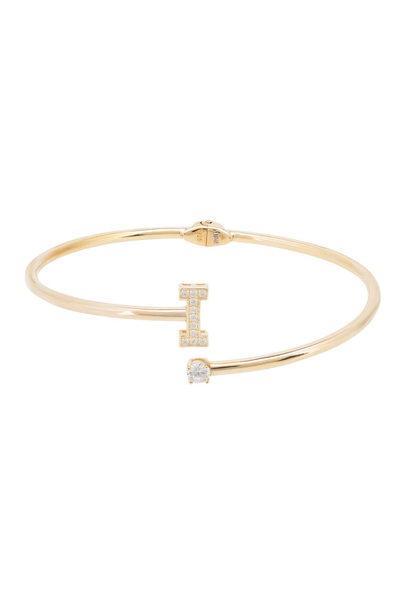 Initial Bangle Gold I featuring a delicate design with a personalized monogram and sparkling cubic zirconia, handcrafted in 925 sterling silver and dipped in 22ct gold.