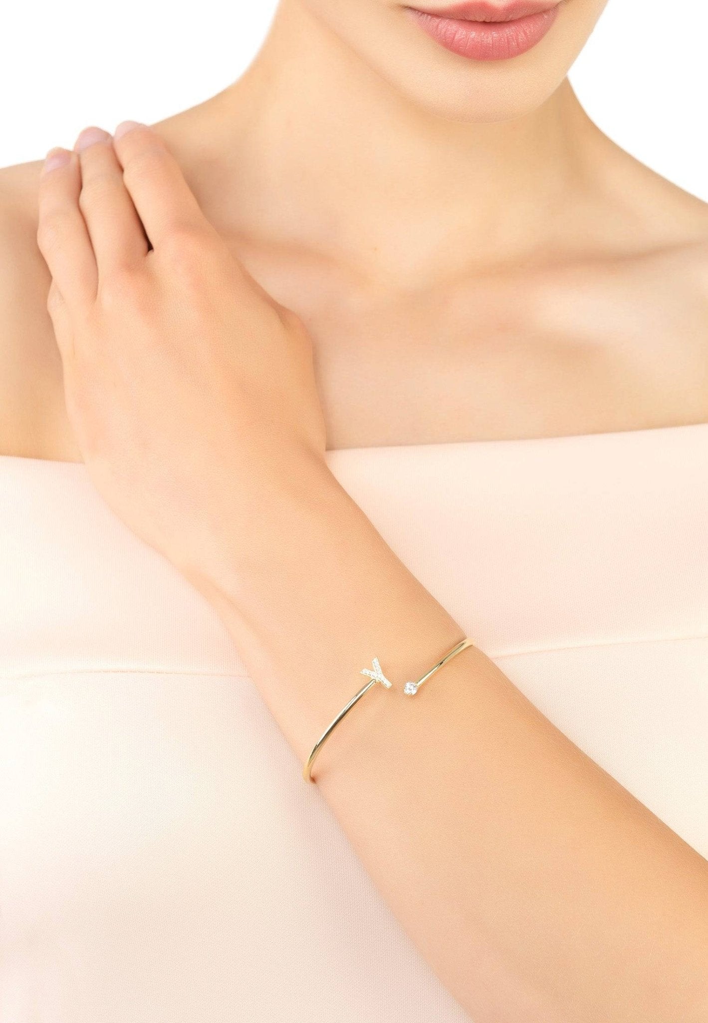 Initial Bangle Gold Y featuring a delicate design with cubic zirconia and a personalized monogram, elegantly crafted in 22ct gold and sterling silver.