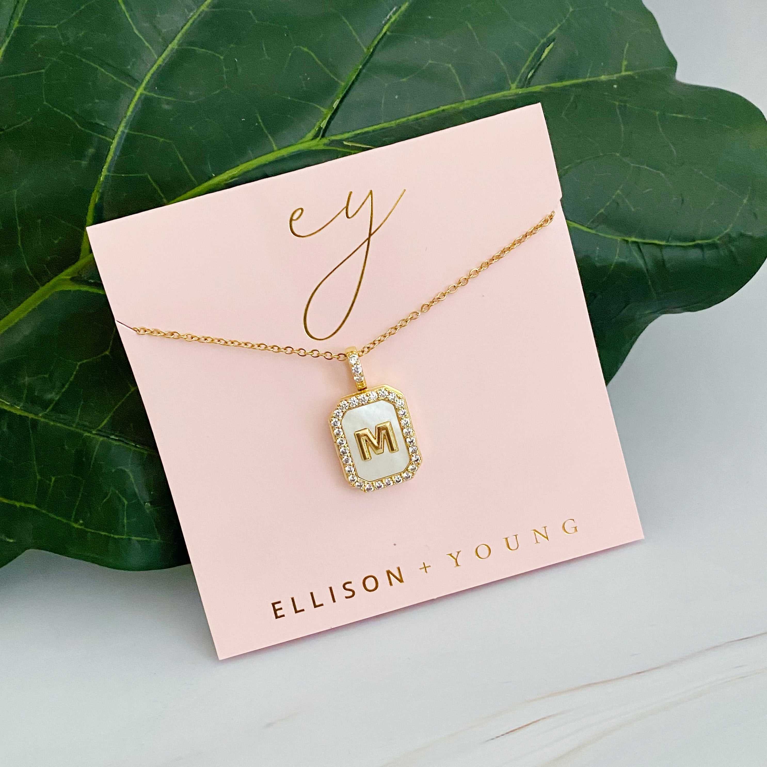 Initial Deco Open Locket Pendant Necklace featuring mother of pearl and cubic zirconia, octagon shape with customizable initial.