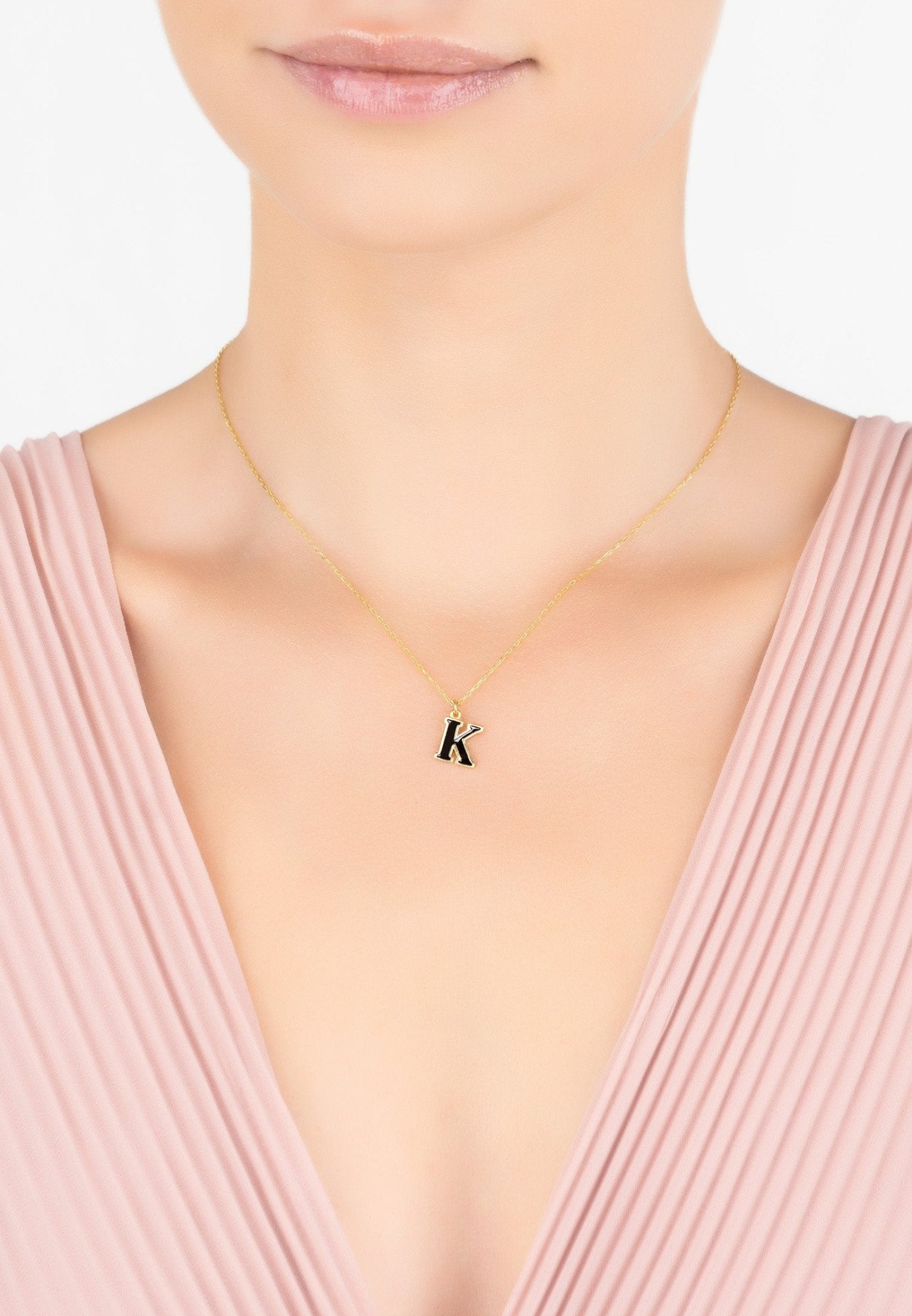 Elegant Initial Enamel Necklace Gold K featuring a black enamel pendant on a delicate gold chain, perfect for personalizing your style.