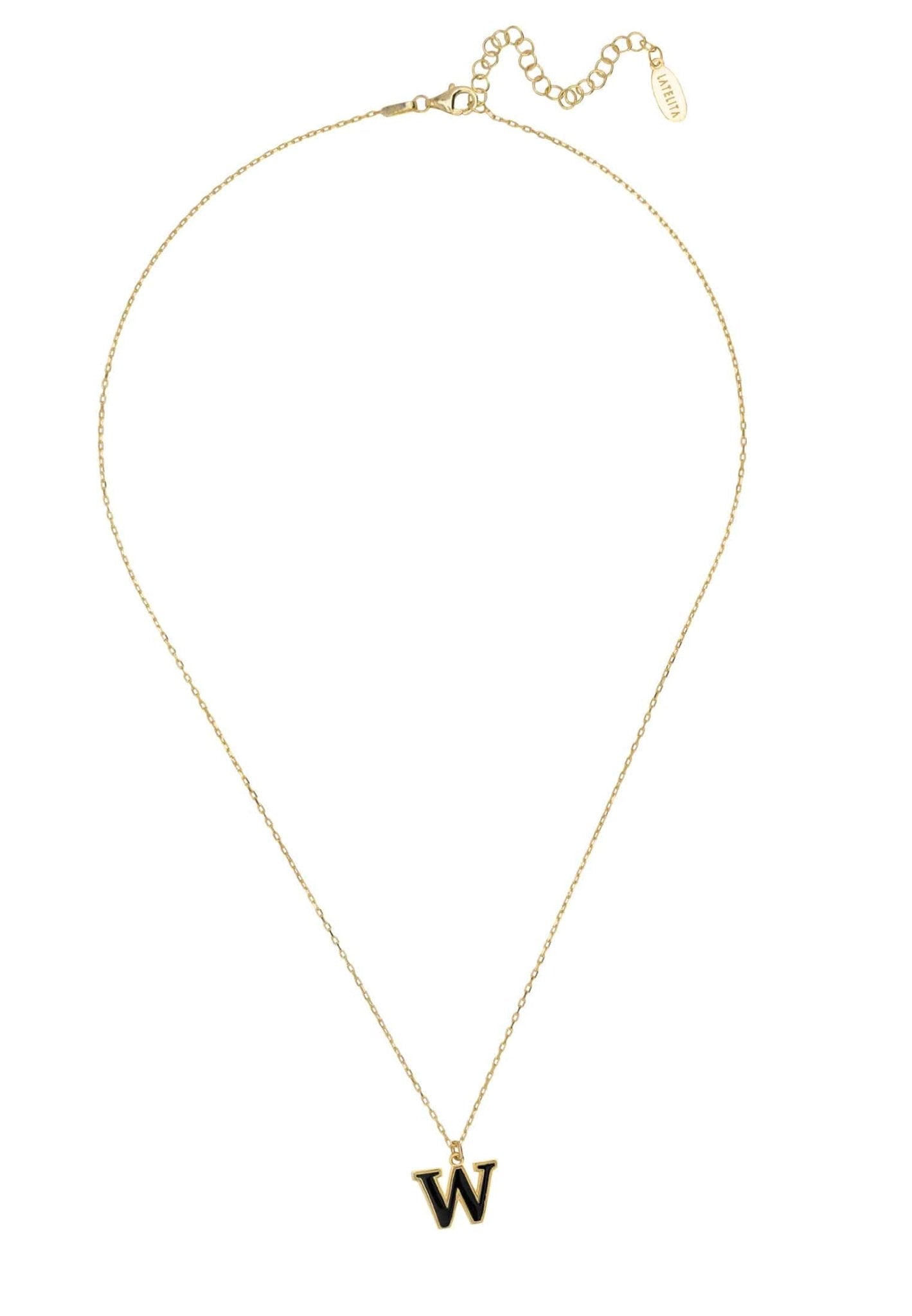 A delicate gold initial enamel necklace featuring a black enamel inlay, elegantly displayed in a signature jewellery box.