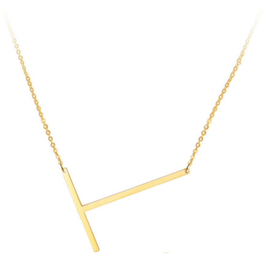 A large initial necklace featuring a polished gold tone finish, showcasing a customizable block letter design.