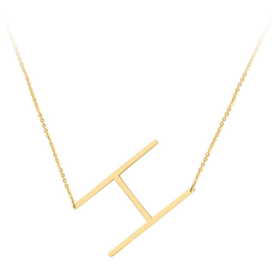 A large initial necklace featuring a polished gold tone finish, showcasing a customizable block letter design.