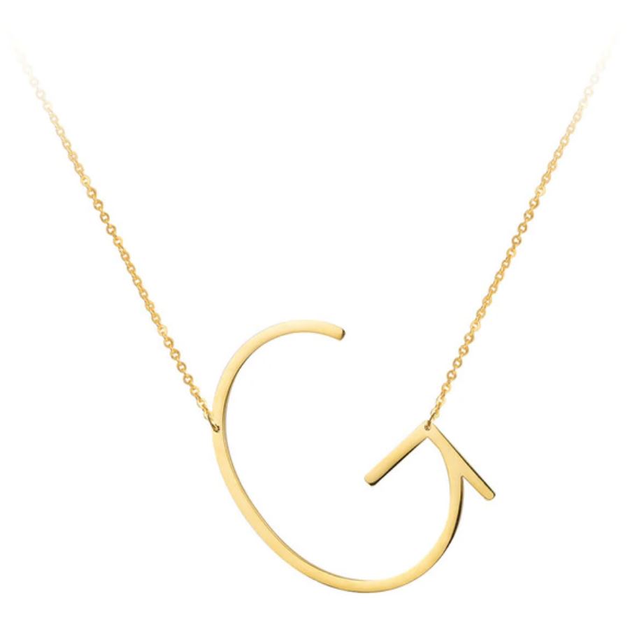 A large initial necklace featuring a polished gold tone finish, showcasing a customizable block letter design.