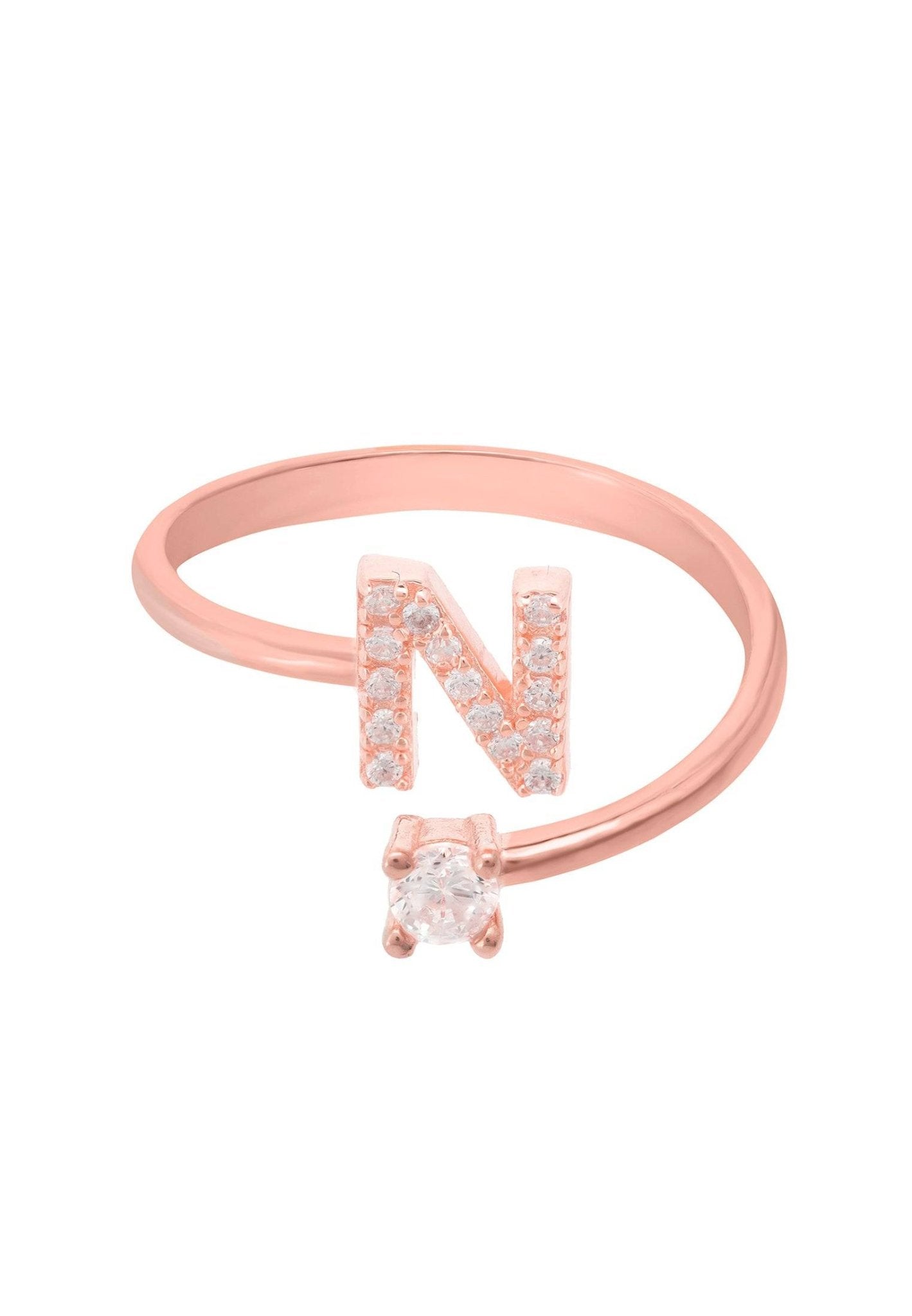 A delicate rose gold initial ring featuring cubic zirconia, showcasing a personalized touch with an open band design.