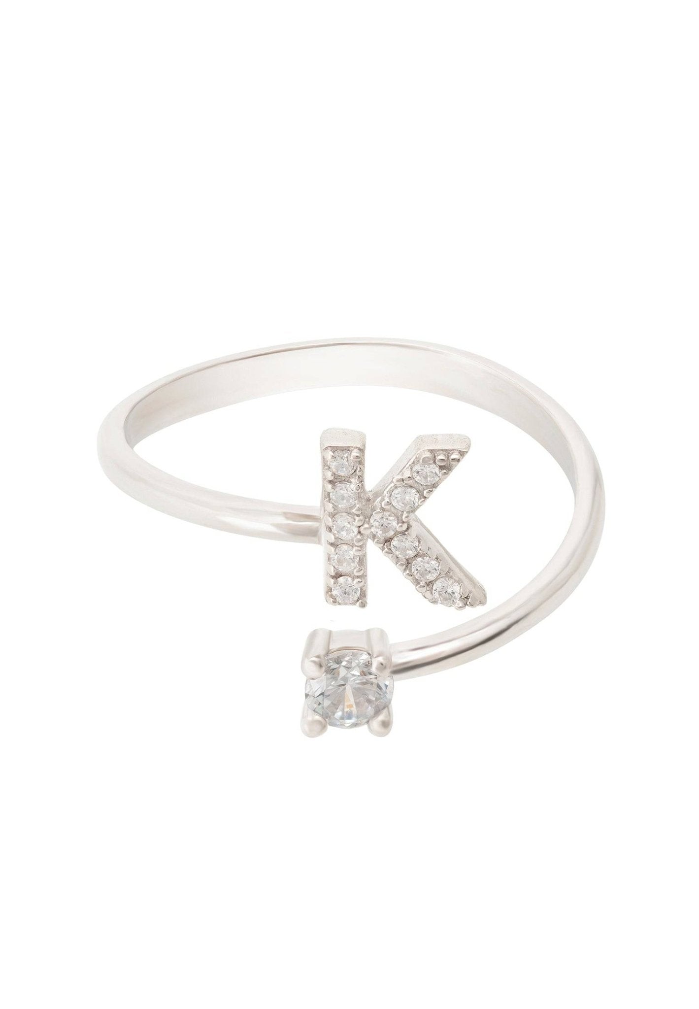 A delicate Initial Ring Silver K crafted from 925 sterling silver, featuring a personalized initial and sparkling cubic zirconia stones.