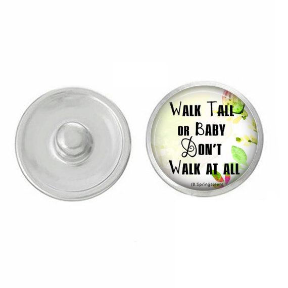 Inspirational snap featuring 'Walk Tall or Baby Don't Walk At All' design, compatible with various snap jewelry bases, showcasing vibrant colors and quality craftsmanship.