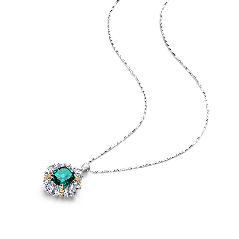 A stunning Green Forest-inspired necklace made of 925 sterling silver, featuring emerald and white sapphire stones, elegantly designed for a luxurious look.