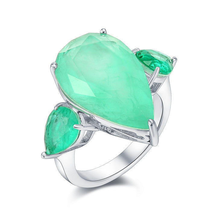 Inspired Tourmaline Paraiba ring featuring a blue paraiba stone set in 925 sterling silver with a white gold finish.