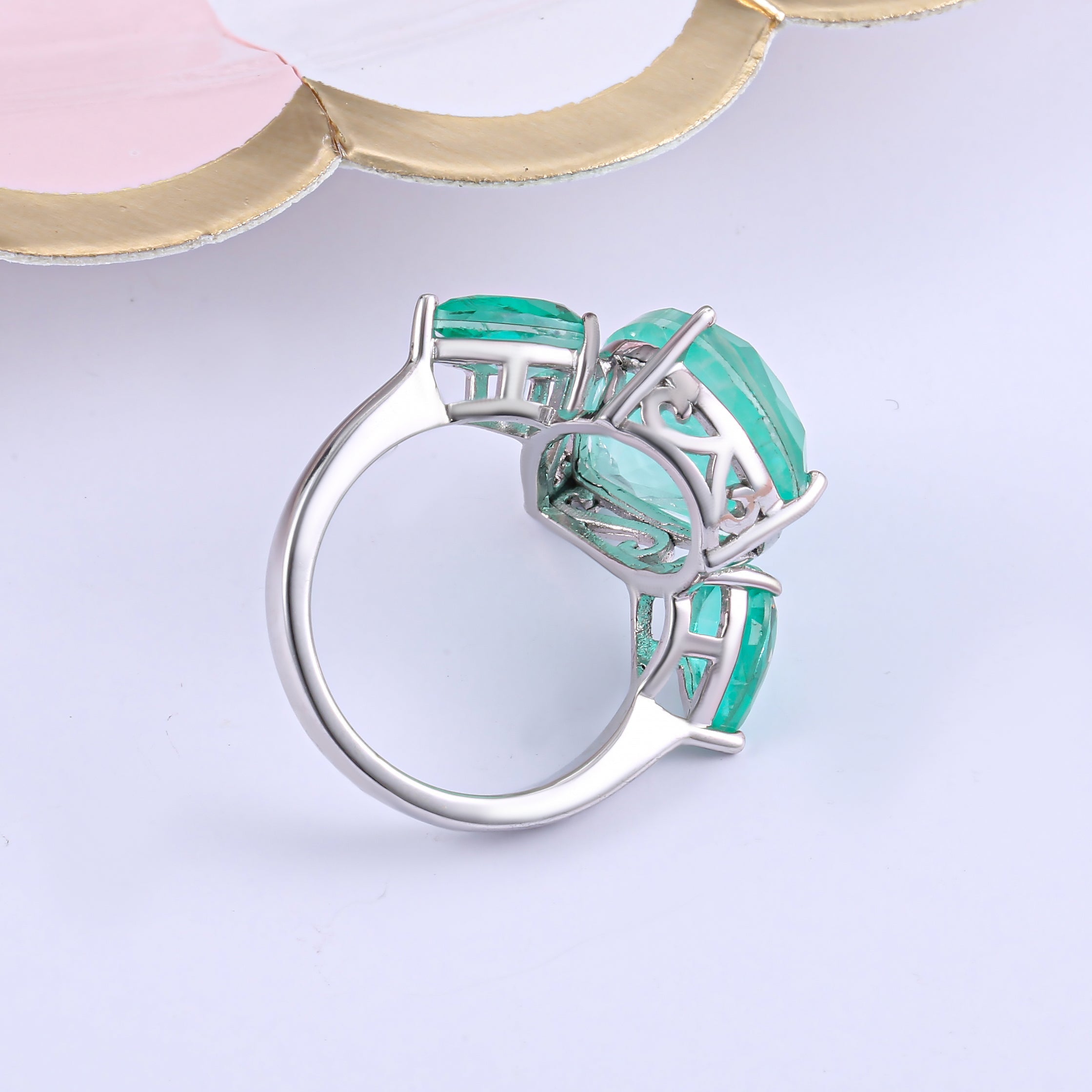 Inspired Tourmaline Paraiba ring featuring a blue paraiba stone set in 925 sterling silver with a white gold finish.